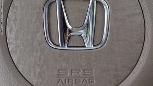 An airbag of a Honda vehicle is displayed in Tokyo on June 15, 2015. Japanese automaker Honda has reported a new death linked to an exploding air bag crisis, bringing the global total to seven fatalities and scores more injuries, which sparked the recall of millions of vehicles. The company confirmed that a woman in Louisiana died in April after the faulty inflator in her 2005 Honda Civic's airbag ruptured, firing metal shrapnel at her.   AFP PHOTO / Yoshikazu TSUNO        (Photo credit should read YOSHIKAZU TSUNO/AFP/Getty Images)