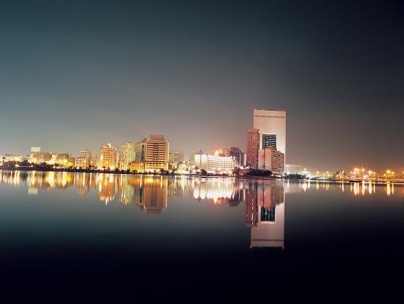 ARTDXG View of the lake and NCB Bank building in Jeddah, Saudi Arabia